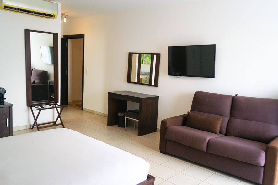Bedroom with settee at Dunas Beach Resort & Spa, Santa Maria, Sal Island, Cape Verde